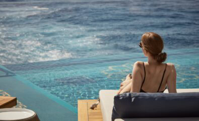 Solo Woman traveler by Explora Pool