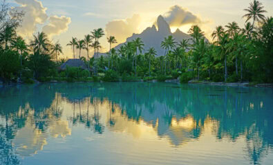 Mont Otemanu mountain reflecting in water at sunset in Bora Bora, French Polynesia, South Pacific